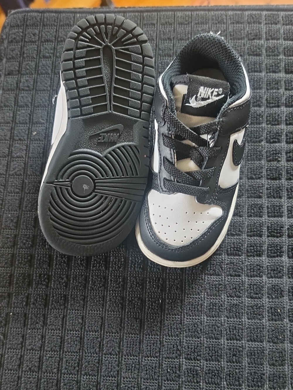 Nike Kids Black and White Low-Top Sneakers with Swoosh